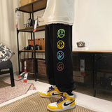 FOESCE Fashion Mens Vintage Washed Hip Hop Smile Face Printed Loose Fit Denim Pants Urban Style Trousers Male Sweatpants