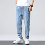 Spring/Summer versatile beam elastic jeans, men's streets installed denim jogging pants, loose Haren pants, increase size M-7XL