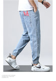 Spring/Summer versatile beam elastic jeans, men's streets installed denim jogging pants, loose Haren pants, increase size M-7XL