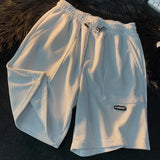 Foesce Summer Men's Large Size Sports Suit Breathable Casual Wear Wild High Street Chic Fake Two-piece Casual T-shirt + Simple Shorts